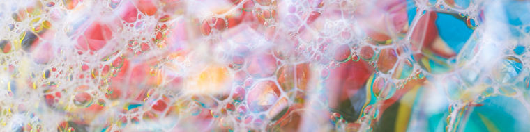 Abstract colourful background with air bubbles in soap foam Abstrakter, bunter Hintergrund mit Luftblasen im Seifenschaum
